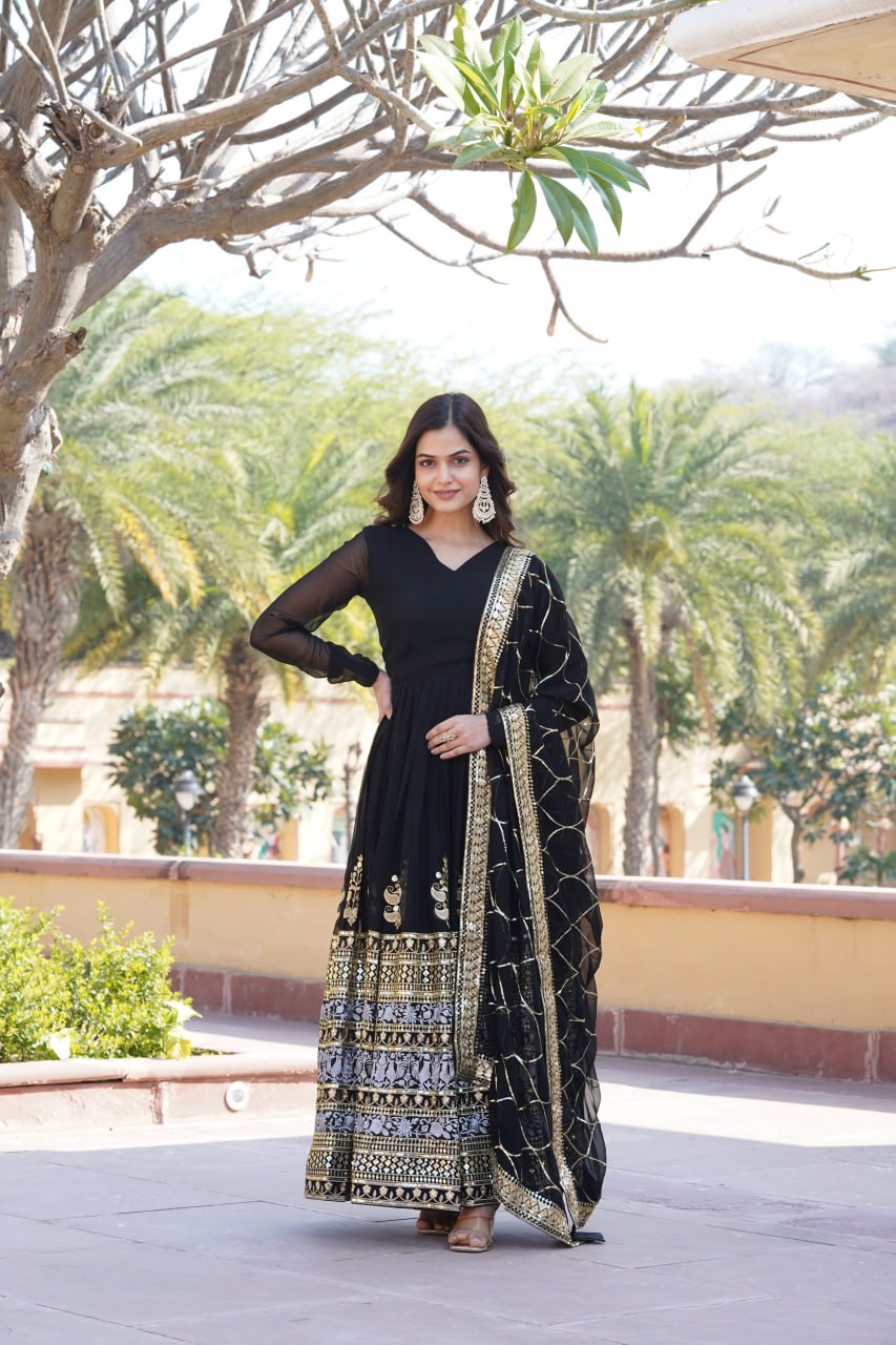 Graceful V-Neck Faux Blooming Gown with Dupatta With Attractive Jari and Thread Embroidered Sequins work with Lace Border.
