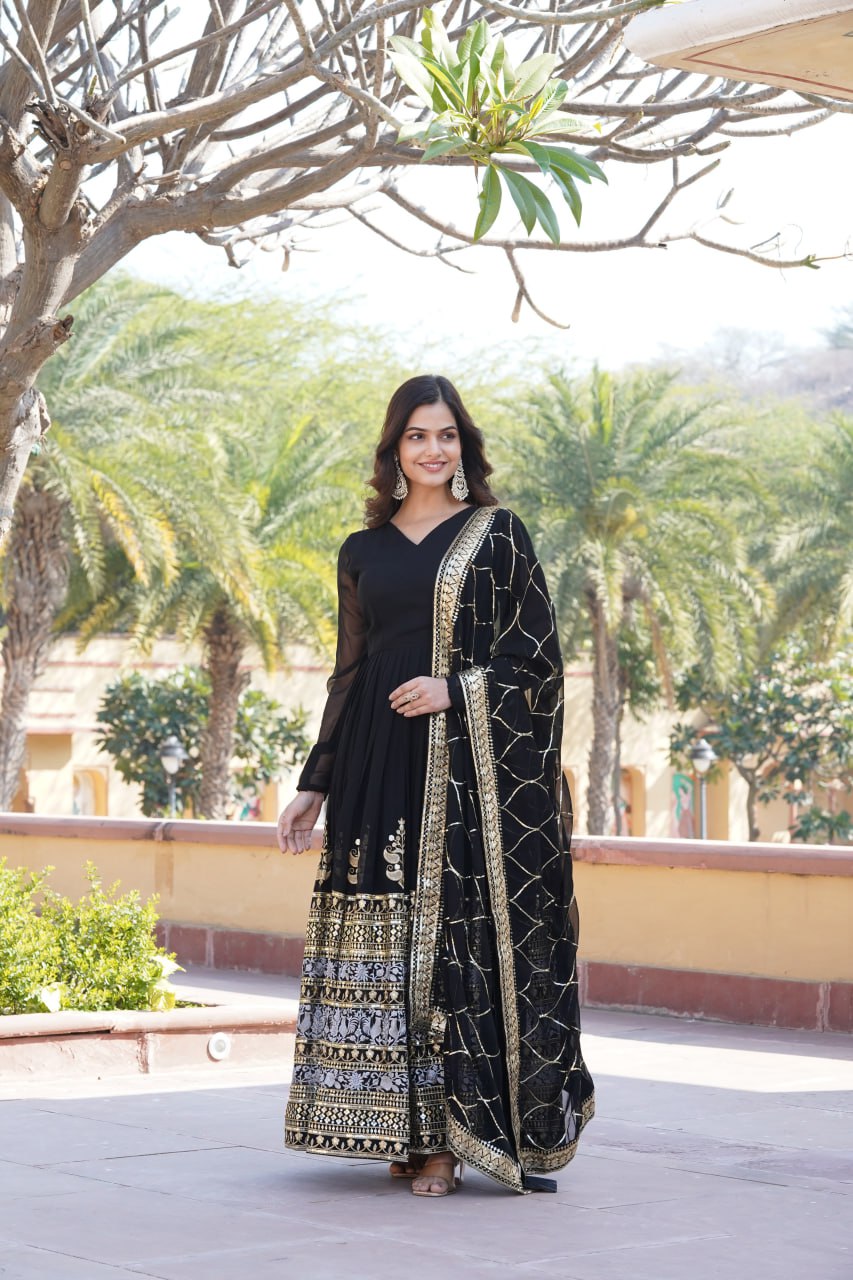 Graceful V-Neck Faux Blooming Gown with Dupatta With Attractive Jari and Thread Embroidered Sequins work with Lace Border.