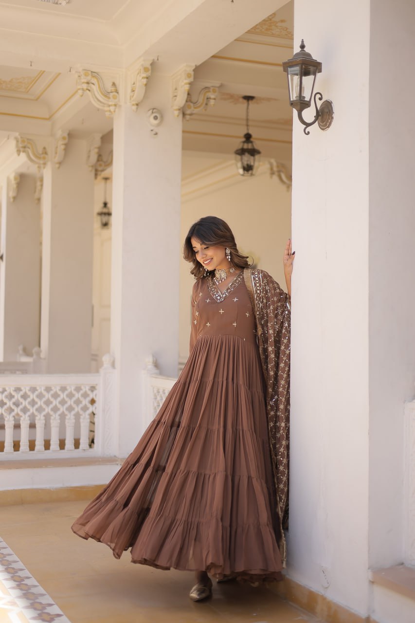 Discover the elegance of traditional attire with our Designer Festive Wear Gown featuring Attractive Sequins Embroidery Work.